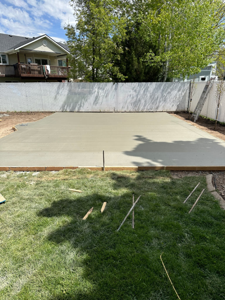 Freshly poured concrete patio slab by Sunrise Elite Construction in Salt Lake City, Utah